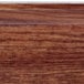 A close up of a wood grain on a Cambro Country Oak Camtray.