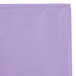 A close up of a purple plastic table cover in a bag with a zipper.