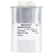 A silver capacitor with a white Arovox label.