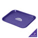 A cobalt blue polypropylene fast food tray with a purple triangle and white text on it.