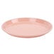 A close-up of a Cambro dark peach fiberglass tray with a small rim.