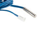 The Cornelius 631500009 Evaporator Sensor Kit with a blue wire with a white connector and a white cable.