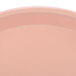 A close-up of a pink Cambro tray.