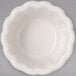 A white Carlisle ramekin with a scalloped edge.