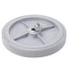 A round grey wheel with a nut on a plastic disc.
