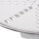 A close up of a Robot Coupe 5/32" stainless steel grating / shredding disc.