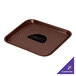 A brown tray with a black logo on it.