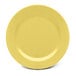 A yellow Elite Global Solutions round melamine plate.