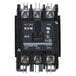 A black non-reversing contactor with silver metal screws and metal wires.