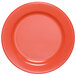 A close up of a red Elite Global Solutions Rio Spring Coral melamine plate.