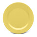 A close-up of an Elite Global Solutions Urban Naturals Olive Oil melamine plate with a yellow surface.