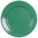 A close up of a green Elite Global Solutions Rio melamine plate with a white circle.