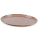 A brown Cambro oval tray with a basketweave pattern.