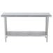 An Advance Tabco stainless steel work table with a stainless steel undershelf.