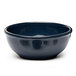 A close-up of a blue Elite Global Solutions melamine bowl.