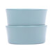 A close-up of two blue Elite Global Solutions melamine ramekins sitting on top of each other.