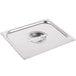 A Vollrath stainless steel hotel pan cover on a stainless steel pan.