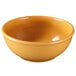 A yellow Elite Global Solutions melamine bowl.