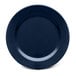 An Elite Global Solutions round melamine plate with a blue surface and curved edge.
