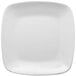 A close-up of a white Elite Global Solutions square plate with a white rim.