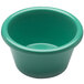 A close-up of a green Elite Global Solutions melamine ramekin.