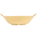 A yellow GET Venetian bowl with a handle.