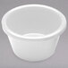 A white round melamine ramekin.