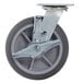 A grey Cambro swivel caster with a metal plate.