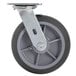 A black and gray castor wheel with a metal bracket.