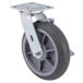 A grey Cambro swivel castor with a black wheel and metal bracket.