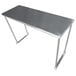 A stainless steel table mounted overshelf from Advance Tabco on a metal table.