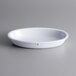 A white oval bowl with the words "Viva Mexico" on the inside.