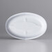 a white surface with a white object on it
