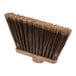 A Carlisle Duo-Sweep medium duty broom head with brown flagged bristles.