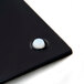 A black melamine tray with white feet.