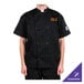 A man wearing a black Chef Revival chef jacket.