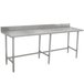 A stainless steel Advance Tabco work table with legs.