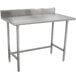 A stainless steel Advance Tabco work table with a stainless steel top.