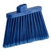 A blue Carlisle broom head with an angled handle.