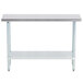 A stainless steel work table with a shelf.