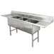 A stainless steel Advance Tabco commercial sink with three compartments and two drainboards.