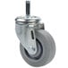 A grey Cambro swivel castor with a metal wheel.