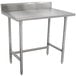 A stainless steel Advance Tabco work table with legs.