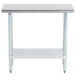 An Advance Tabco stainless steel work table with a galvanized shelf.