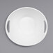 A white Elite Global Solutions small oval bowl with handles.
