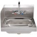 A stainless steel Advance Tabco hand sink with a faucet.