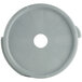 A grey plastic disc with a circular hole.
