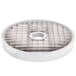 A white circular metal grid with holes.