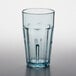 A clear plastic tumbler with a blue rim.