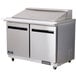 An Arctic Air stainless steel 48" mega top refrigerator with 2 doors.